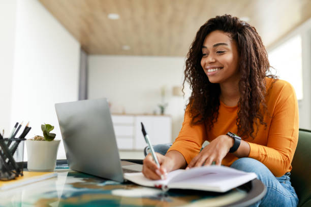 Student writing an academic paper in Atlanta